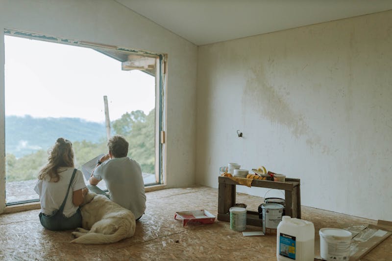 a couple renovating a room