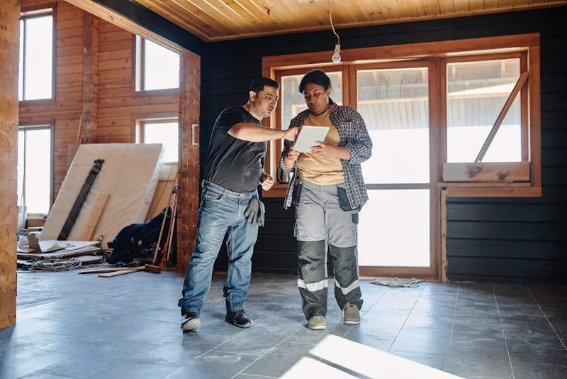 a home contractor talking to a client